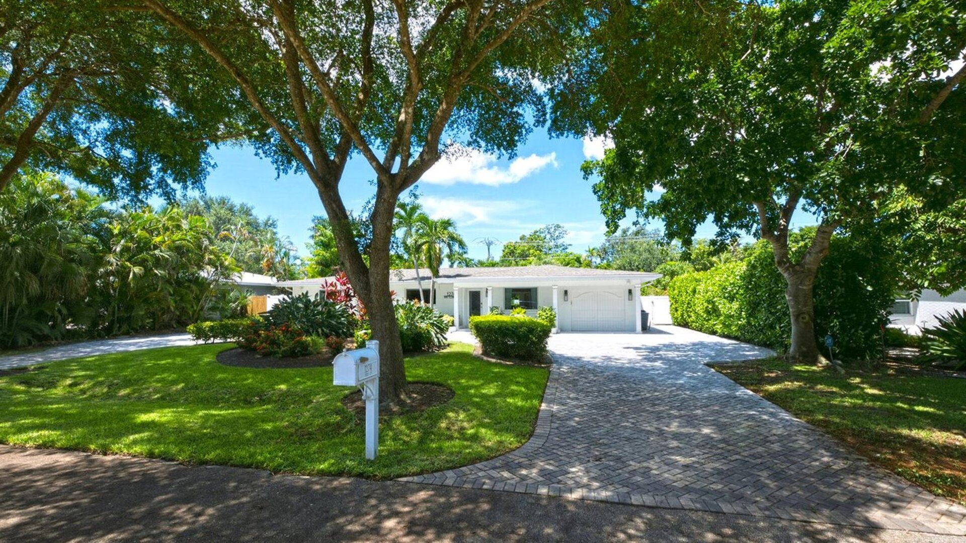 The Coquina Cottage | 1274 Pine Court in Naples, FL